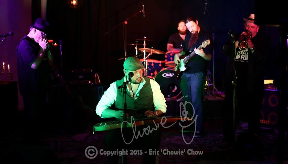 Playing Harmonica (left) with Cameron Holmes Band