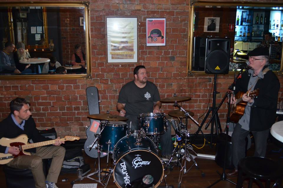 On stage with lead guitarist, Lee Kindler and drummer, Mark Cooper